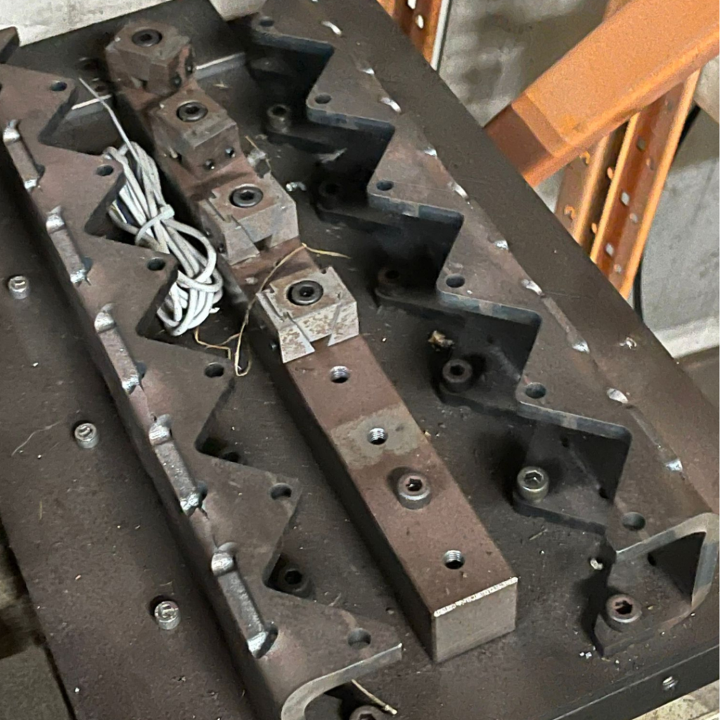 Laser cutting and bending of product fixture